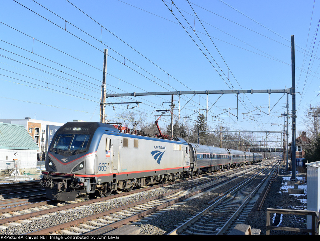 Sprinter # 665 hustling Amtrak Keystone Train # 663 bound for Harrisburg, PA